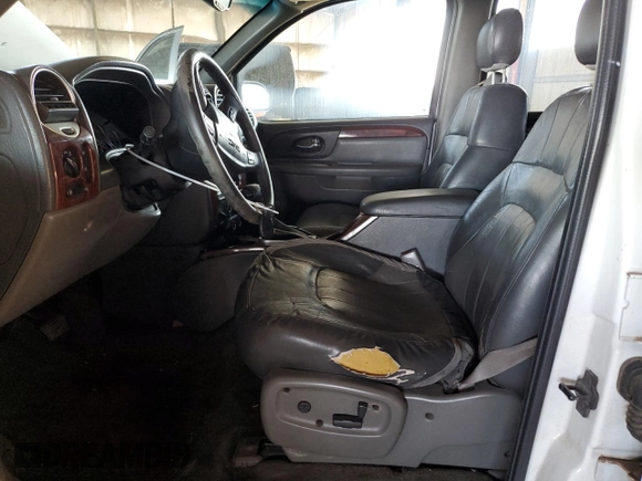 2002 GMC Envoy SLT with VIN 1GKDT13S922128924, listed as a Copart auction lot 46131035 with 162,499 mi miles and Salvage Title. Bid and sale history available at carsss.com. Image 7.