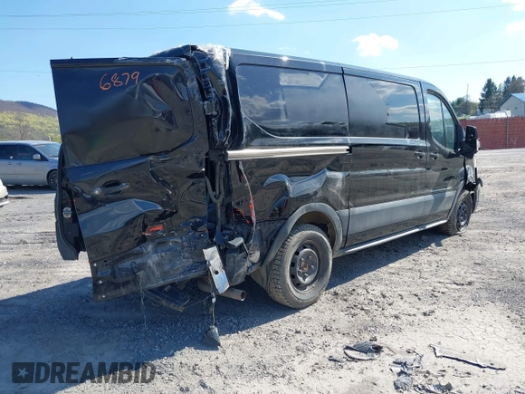 2021 Ford Transit Cargo with VIN 1FTYE1Y85MKA34465, listed as a IAAI auction lot 41736879 with 77,215 mi miles. Bid and sale history available at carsss.com. Image 4.
