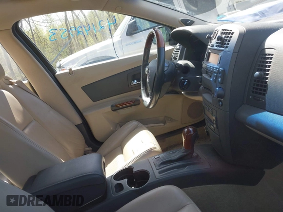 2003 Cadillac CTS with VIN 1G6DM57N430125143, listed as a IAAI auction lot 42142953 with 85,913 mi miles. Bid and sale history available at carsss.com. Image 5.