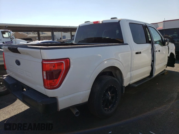 2021 Ford F-150 XL с VIN 1FTFW1CD7MFD11411, выставлен на аукционе Copart как лот 74180004 с пробегом 13 382 миль миль и Списание • Salvage title. История ставок и продаж доступна на DreamBid. Изображение 3.
