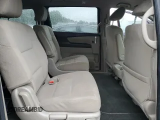 2014 Honda Odyssey LX z VIN 5FNRL5H24EB098072, wystawiony jako Copart lot #57577385 z przebiegiem 215 069 mil mil oraz Szkoda całkowita • Salvage title. Historia ofert i sprzedaży dostępna na DreamBid. Obrazek 11.
