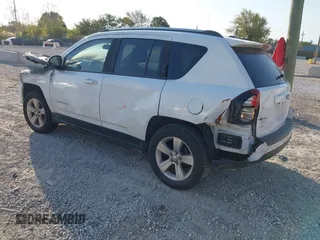 2014 Jeep Compass Sport with VIN 1C4NJDBB3ED892141, listed as a IAAI auction lot 40572980 with 95,826 mi miles. Bid and sale history available at carsss.com. Image 3.