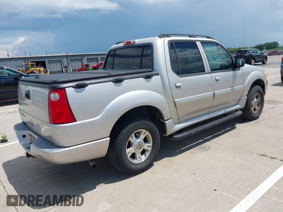 2004 Ford Explorer Sport Trac XLS z VIN 1FMZU77K64UA98358, wystawiony jako IAAI lot #42637743 z przebiegiem 158 359 mil mil oraz . Historia ofert i sprzedaży dostępna na DreamBid. Obrazek 4.
