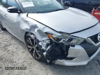 2018 Nissan Maxima S z VIN 1N4AA6APXJC360916, wystawiony jako IAAI lot #41543171 z przebiegiem 51 711 mil mil oraz . Historia ofert i sprzedaży dostępna na DreamBid. Obrazek 6.