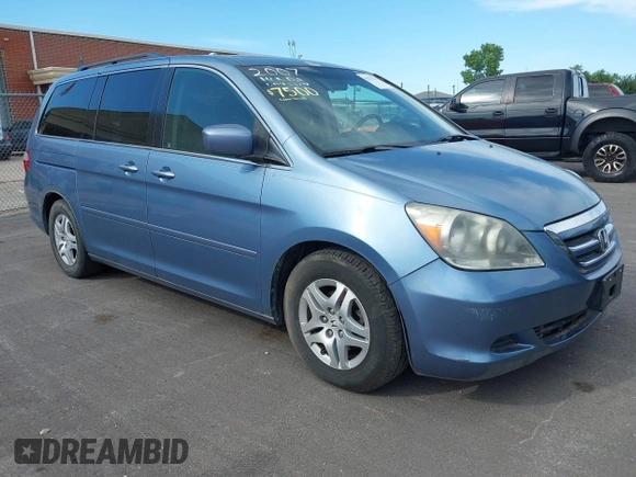 2007 Honda Odyssey EX-L z VIN 5FNRL38757B121989, wystawiony jako IAAI lot #42323131 z przebiegiem 174 906 mil mil oraz . Historia ofert i sprzedaży dostępna na DreamBid. Obrazek 1.