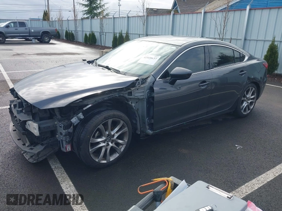 2014 Mazda 6 i Grand Touring with VIN JM1GJ1W63E1147380, listed as a IAAI auction lot 41928637 with 140,091 mi miles and . Bid and sale history available at DreamBid. Image 19.