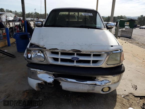 1997 Ford F-150 z VIN 1FTDX0766VKA86983, wystawiony jako Copart lot #50896215 z przebiegiem 214 746 mil mil oraz Szkoda całkowita • Salvage title. Historia ofert i sprzedaży dostępna na DreamBid. Obrazek 5.