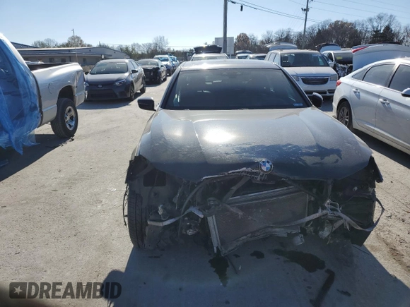 2018 BMW 7 Series 750i with VIN WBA7F0C55JGM23635, listed as a Copart auction lot 83718114 with 0 mi miles and Salvage Title. Bid and sale history available at carsss.com. Image 5.