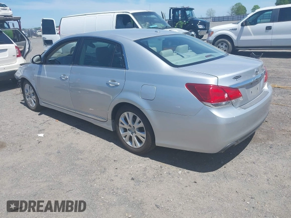 2011 Toyota Avalon with VIN 4T1BK3DBXBU411770, listed as a IAAI auction lot 42060147 with 128,360 mi miles and . Bid and sale history available at carsss.com. Image 3.