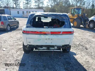 2025 Rivian R1S Adventure with VIN 7PDSGBBA0SN049154, listed as a IAAI auction lot 41160166 with 3,036 mi miles. Bid and sale history available at carsss.com. Image 6.