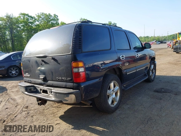 2004 Chevrolet Tahoe Special Service with VIN 1GNEK13V44J128410, listed as a IAAI auction lot 42175055 with 212,138 mi miles. Bid and sale history available at carsss.com. Image 4.