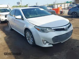 2013 Toyota Avalon XLE with VIN 4T1BK1EB8DU065806, listed as a IAAI auction lot 42043614 with 197,049 mi miles and . Bid and sale history available at carsss.com. Image 1.