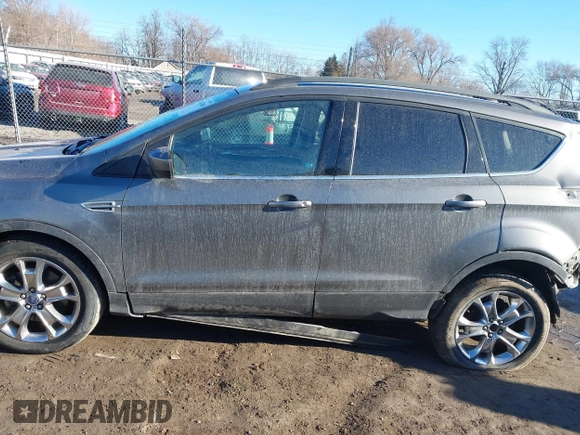 2014 Ford Escape SE z VIN 1FMCU9GXXEUB99093, wystawiony jako IAAI lot #41662040 z przebiegiem 120 783 mil mil oraz . Historia ofert i sprzedaży dostępna na DreamBid. Obrazek 15.