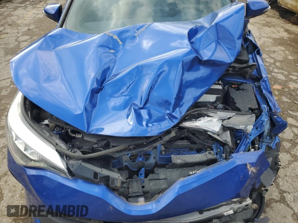 2021 Toyota C-HR LE with VIN JTNKHMBX2M1107890, listed as a Copart auction lot 77992554 with 54,219 mi miles and Salvage Title. Bid and sale history available at carsss.com. Image 13.