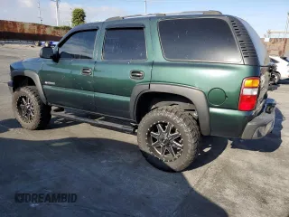 2003 Chevrolet Tahoe LS with VIN 1GNEC13V53R101245, listed as a Copart auction lot 65222214 with 259,040 mi miles and Salvage Title. Bid and sale history available at carsss.com. Image 2.