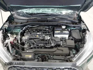 2022 Toyota Corolla Cross XLE with VIN 7MUDAABG9NV043308, listed as a IAAI auction lot 42467615 with 45,502 mi miles and . Bid and sale history available at DreamBid. Image 10.