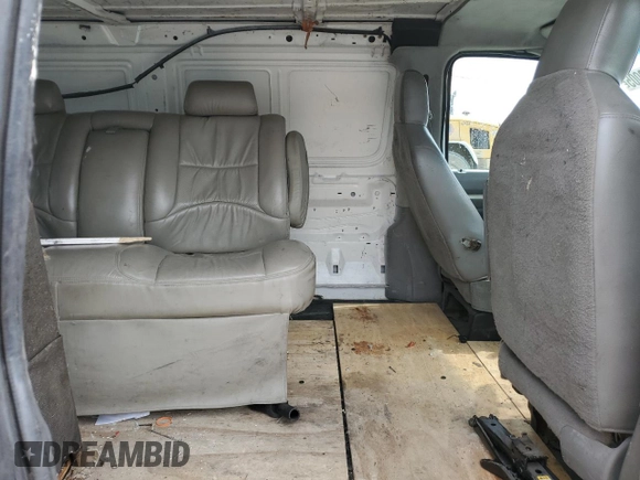 2010 Ford Econoline Cargo Commercial z VIN 1FTNE2EW4ADA35523, wystawiony jako Copart lot #53662005 z przebiegiem Nie podano mil oraz Szkoda całkowita • Salvage title. Historia ofert i sprzedaży dostępna na DreamBid. Obrazek 11.