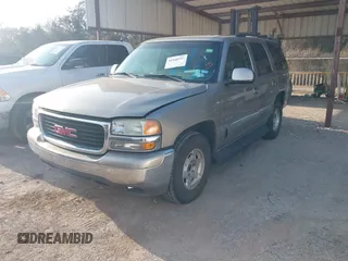 2003 GMC Yukon SLT with VIN 1GKEC13Z43R163266, listed as a IAAI auction lot 41540592 with 173,804 mi miles. Bid and sale history available at carsss.com. Image 2.