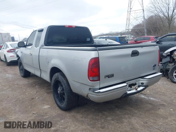 2002 Ford F-150 XL with VIN 1FTRX17212NA45843, listed as a IAAI auction lot 41575856 with 136,570 mi miles. Bid and sale history available at carsss.com. Image 3.