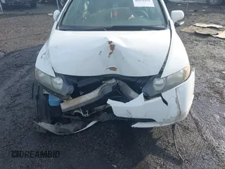 2006 Honda Civic LX with VIN 1HGFA16516L115196, listed as a IAAI auction lot 41572332 with 221,861 mi miles and . Bid and sale history available at DreamBid. Image 12.