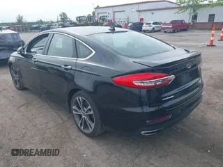 2020 Ford Fusion Titanium with VIN 3FA6P0K94LR117138, listed as a IAAI auction lot 42345819 with 88,117 mi miles and . Bid and sale history available at DreamBid. Image 3.