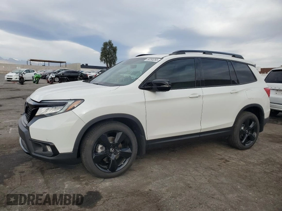 2021 Honda Passport Elite with VIN 5FNYF8H02MB039538, listed as a Copart auction lot 50265265 with 16,737 mi miles and Salvage Title. Bid and sale history available at carsss.com. Image 1.