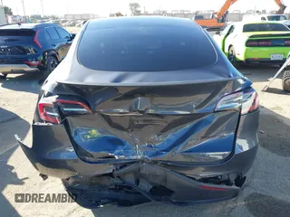 2022 Tesla Model Y Performance with VIN 7SAYGDEF7NF562895, listed as a IAAI auction lot 41692864 with 29,904 mi miles and . Bid and sale history available at DreamBid. Image 15.
