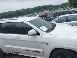 2021 Jeep Grand Cherokee Trackhawk with VIN 1C4RJFN95MC843131, listed as a IAAI auction lot 42688185 with 16,391 mi miles and . Bid and sale history available at DreamBid. Image 13.