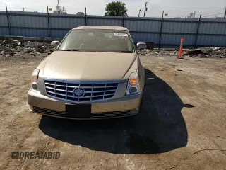 2006 Cadillac DTS 1SD z VIN 1G6KD57Y16U117113, wystawiony jako Copart lot #71485044 z przebiegiem 109 948 mil mil oraz Szkoda całkowita • Salvage title. Historia ofert i sprzedaży dostępna na DreamBid. Obrazek 11.