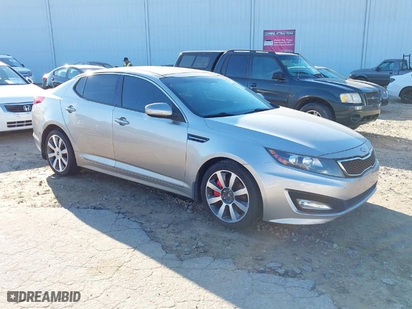 2013 Kia Optima SX with VIN 5XXGR4A65DG153881, listed as a IAAI auction lot 41874958 with 220,426 mi miles. Bid and sale history available at carsss.com. Image 1.