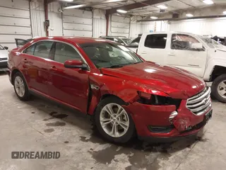 2014 Ford Taurus SEL z VIN 1FAHP2E83EG137639, wystawiony jako IAAI lot #41535259 z przebiegiem 62 978 mil mil oraz . Historia ofert i sprzedaży dostępna na DreamBid. Obrazek 1.