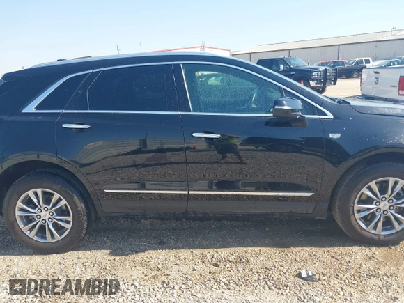 2023 Cadillac XT5 AWD Premium Luxury with VIN 1GYKNDRS7PZ158566, listed as a IAAI auction lot 41763127 with 58,248 mi miles and . Bid and sale history available at DreamBid. Image 13.