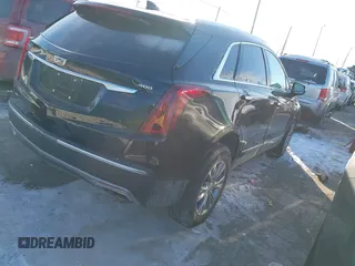 2021 Cadillac XT5 AWD Premium Luxury with VIN 1GYKNDRS2MZ152878, listed as a IAAI auction lot 41347259 with 21,891 mi miles. Bid and sale history available at carsss.com. Image 4.