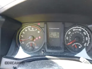 2016 Toyota Tacoma SR z VIN 5TFRX5GN8GX062166, wystawiony jako IAAI lot #42257541 z przebiegiem 166 354 mil mil oraz . Historia ofert i sprzedaży dostępna na DreamBid. Obrazek 7.