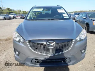2014 Mazda CX-5 Touring with VIN JM3KE4CY0E0302583, listed as a IAAI auction lot 41947735 with 122,077 mi miles. Bid and sale history available at carsss.com. Image 12.