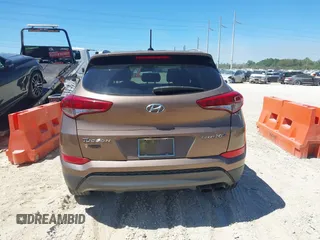 2016 Hyundai Tucson Sport with VIN KM8J33A29GU054909, listed as a IAAI auction lot 41835688 with 90,751 mi miles. Bid and sale history available at carsss.com. Image 16.