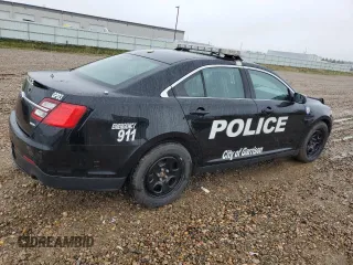 2014 Ford Police Interceptor with VIN 1FAHP2MT9EG111729, listed as a Copart auction lot 56947315 with 74,887 mi miles and Salvage title. Bid and sale history available at DreamBid. Image 3.