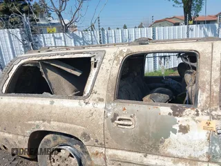 2003 Chevrolet Suburban LT z VIN 3GNEC16Z23G120835, wystawiony jako IAAI lot #41885363 z przebiegiem Nie podano mil oraz . Historia ofert i sprzedaży dostępna na DreamBid. Obrazek 14.