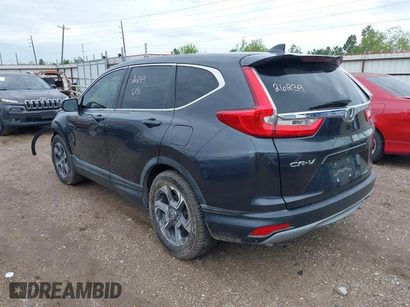 2017 Honda CR-V EX with VIN 7FARW1H54HE043494, listed as a IAAI auction lot 41887318 with 93,904 mi miles. Bid and sale history available at carsss.com. Image 3.