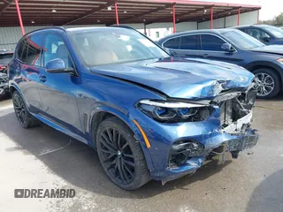 2022 BMW X5 xDrive40i z VIN 5UXCR6C05N9K88827, wystawiony jako IAAI lot #41823531 z przebiegiem 66 021 mil mil oraz . Historia ofert i sprzedaży dostępna na DreamBid. Obrazek 1.
