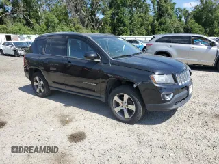 2016 Jeep Compass High Altitude Edition with VIN 1C4NJDEB6GD697021, listed as a Copart auction lot 54332755 with 104,611 mi miles and Salvage Title. Bid and sale history available at carsss.com. Image 4.