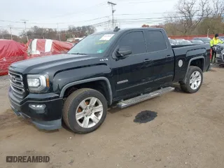 2016 GMC Sierra 1500 with VIN 1GTV2LEH9GZ421642, listed as a IAAI auction lot 40870826 with 105,326 mi miles. Bid and sale history available at carsss.com. Image 2.