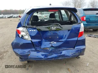 2012 Honda Fit Sport with VIN JHMGE8H50CC001195, listed as a IAAI auction lot 42083901 with 149,303 mi miles and . Bid and sale history available at DreamBid. Image 6.