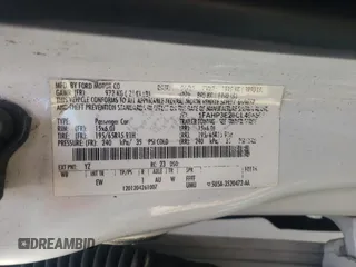 2012 Ford Focus S with VIN 1FAHP3E26CL404567, listed as a Copart auction lot 52162055 with 195,060 mi miles and Salvage Title. Bid and sale history available at DreamBid. Image 12.