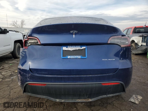 2020 Tesla Model Y Long Range with VIN 5YJYGDEE6LF024397, listed as a Copart auction lot 46519605 with 81,236 mi miles and Non Repairable. Bid and sale history available at DreamBid. Image 6.