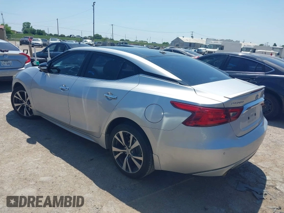 2016 Nissan Maxima SL with VIN 1N4AA6AP1GC430988, listed as a IAAI auction lot 42047844 with 122,685 mi miles and . Bid and sale history available at DreamBid. Image 3.