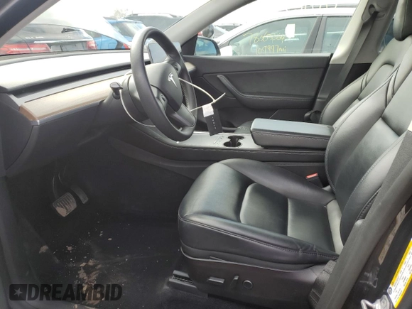 2022 Tesla Model Y Long Range with VIN 7SAYGDEE7NF386082, listed as a Copart auction lot 47191625 with 73,634 mi miles and Salvage Title. Bid and sale history available at carsss.com. Image 7.