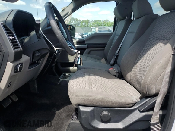 2018 Ford F-150 XL with VIN 1FTEW1E53JKC57304, listed as a Copart auction lot 57168915 with 118,498 mi miles and Salvage title. Bid and sale history available at DreamBid. Image 7.