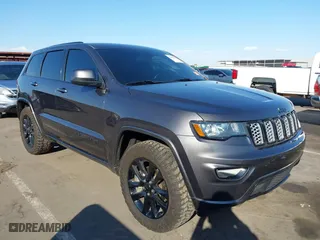 2021 Jeep Grand Cherokee Laredo X with VIN 1C4RJEAG2MC785610, listed as a IAAI auction lot 40578955 with 58,213 mi miles. Bid and sale history available at carsss.com. Image 1.