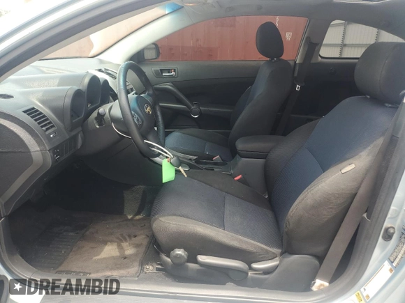 2006 Scion tC z VIN JTKDE167560101159, wystawiony jako Copart lot #58065315 z przebiegiem 136 428 mil mil oraz Szkoda całkowita • Salvage title. Historia ofert i sprzedaży dostępna na DreamBid. Obrazek 7.